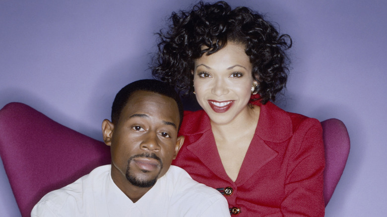 Tisha Campbell and Martin Lawrence posing