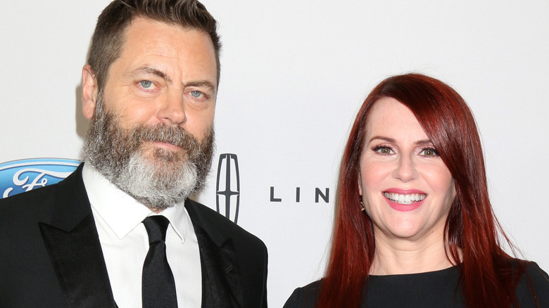 Nick Offerman and Megan Mullally posing