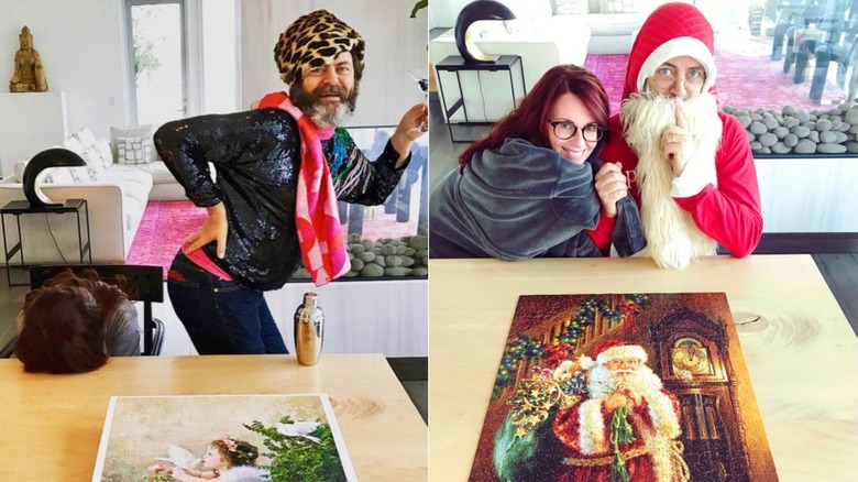 Megan Mullally and Nick Offerman posing with puzzles