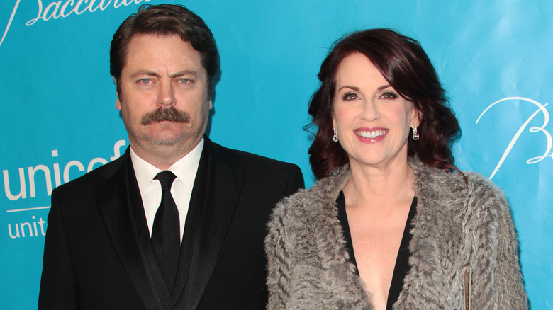 Nick Offerman and Megan Mullally posing