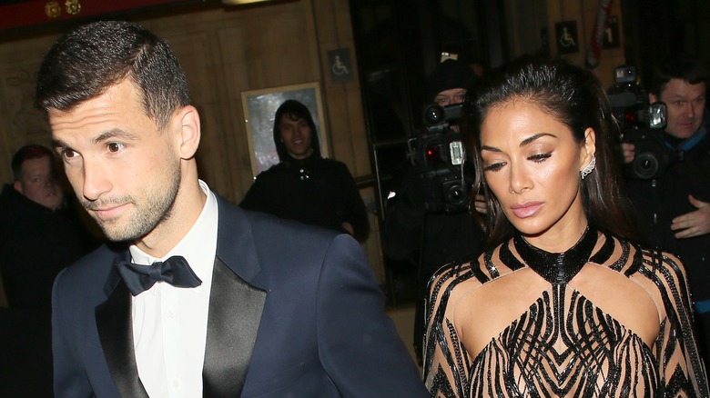 Grigor Dimitrov and Nicole Scherzinger leaving an event