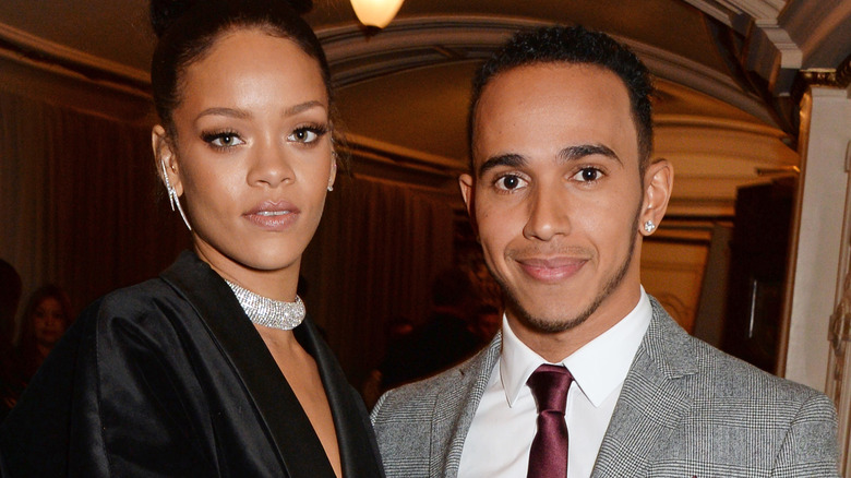 Rihanna and Lewis Hamilton posing 