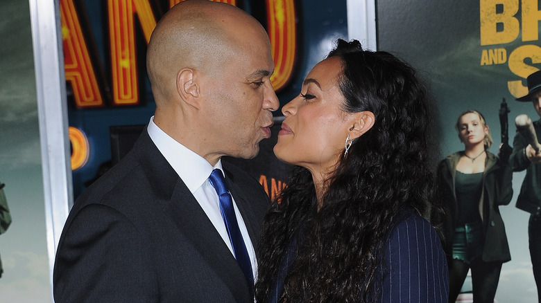 Cory Booker and Rosario Dawson about to kiss