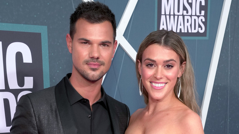 Taylor Lautner and Taylor Dome smiling