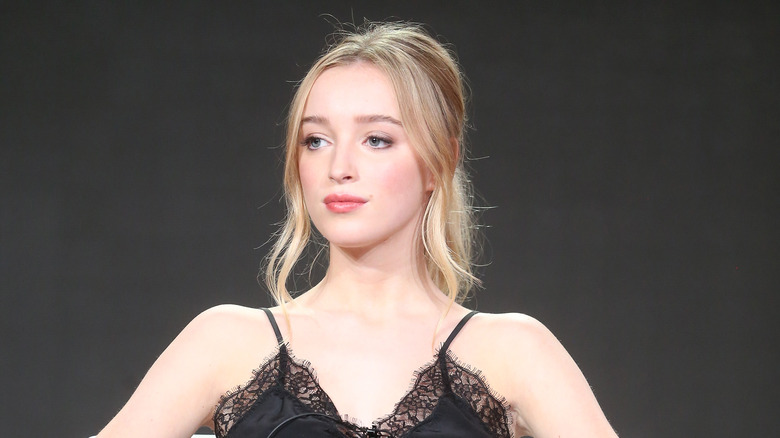 Phoebe Dynevor posing