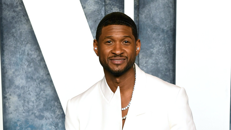 Usher wearing all white