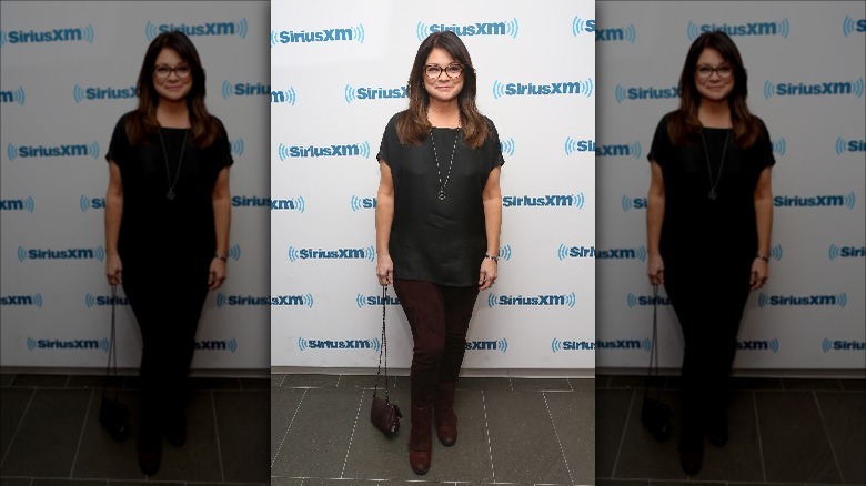 Valerie Bertinelli poses in dark outfit