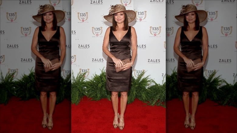 Valerie Bertinelli in brown dress and hat