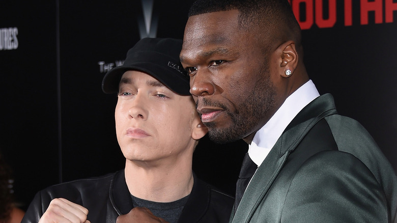 Eminem and 50 Cent black suit