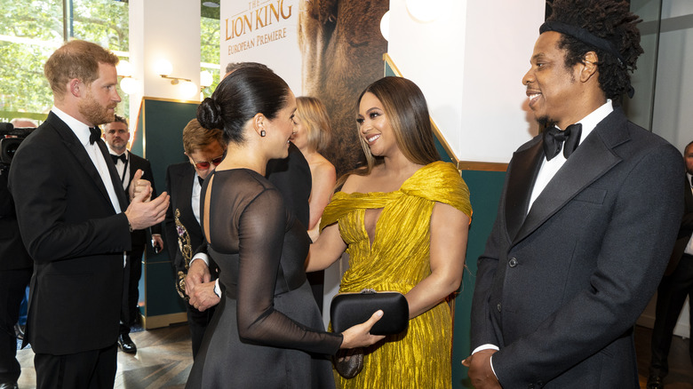 Meghan Markle, Beyoncé smiling at each other