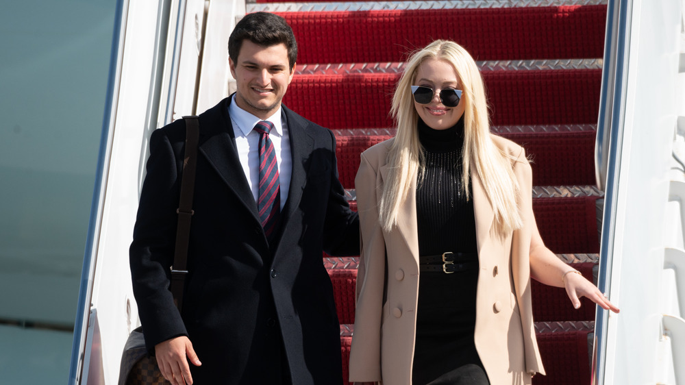 Tiffany Trump and fiance Michael Boulos exiting Airforce One