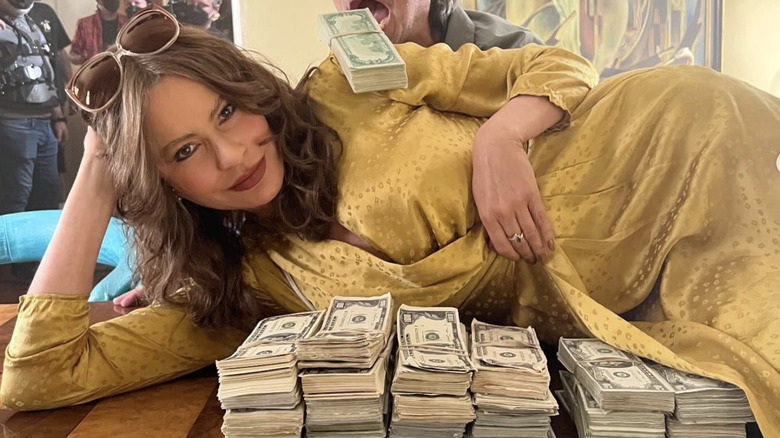 Sofia Vergara posing with money