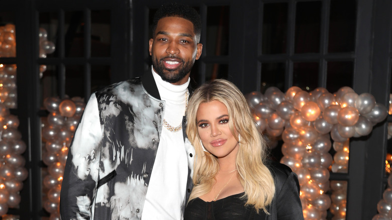 Tristan Thompson and Khloe Kardashian pose in 2018