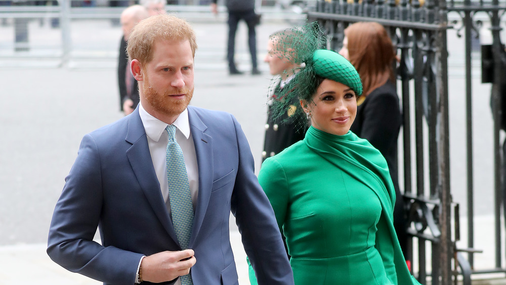Prince Harry and Meghan Markle walking