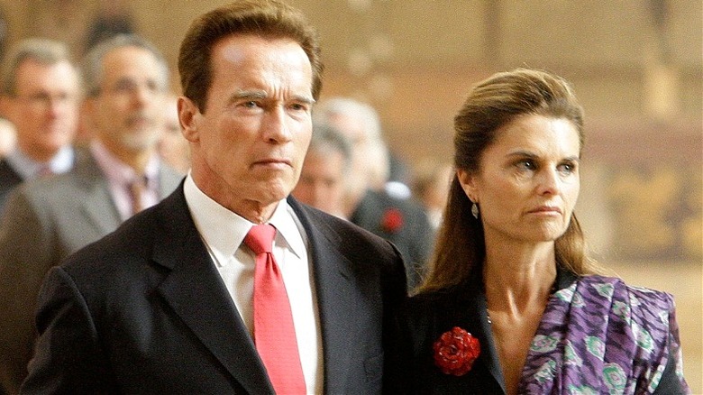 Arnold Schwarzenegger and Maria Shriver together, looking glum