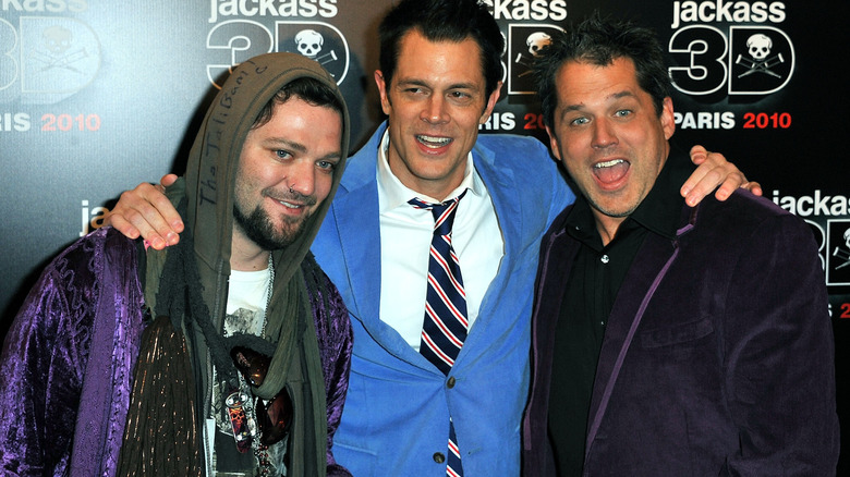 Bam Margera, Johnny Knoxville, and Jeff Tremaine posing 