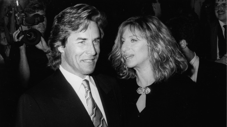 Don Johnson and Barbra Streisand amid press 