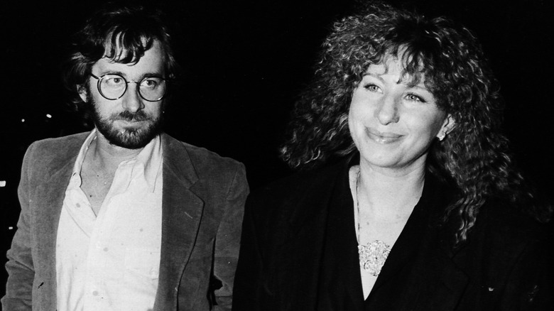 A dour Steven Spielberg with a smirking Barbra Streisand