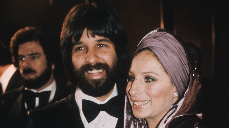 Jon Peters and Barbra Streisand smiling 