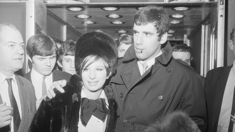 Barbra Streisand and Elliot Gould amid press 