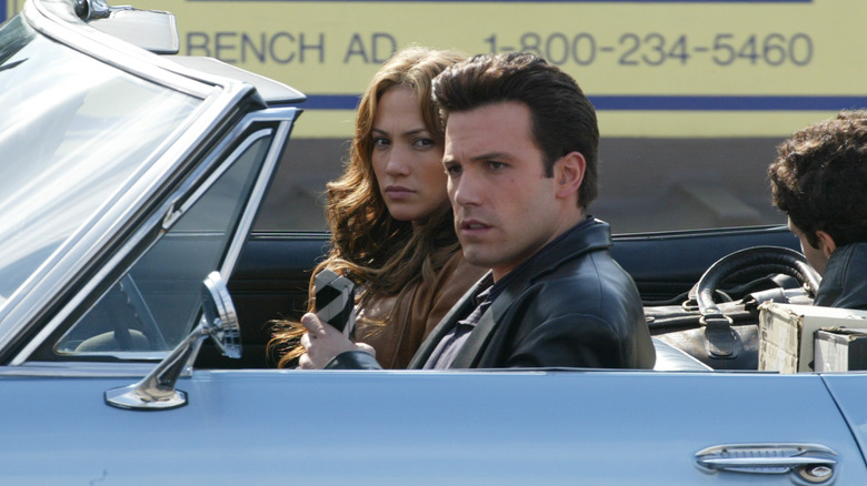 Jennifer Lopez and Ben Affleck filming Gigli, seated in car