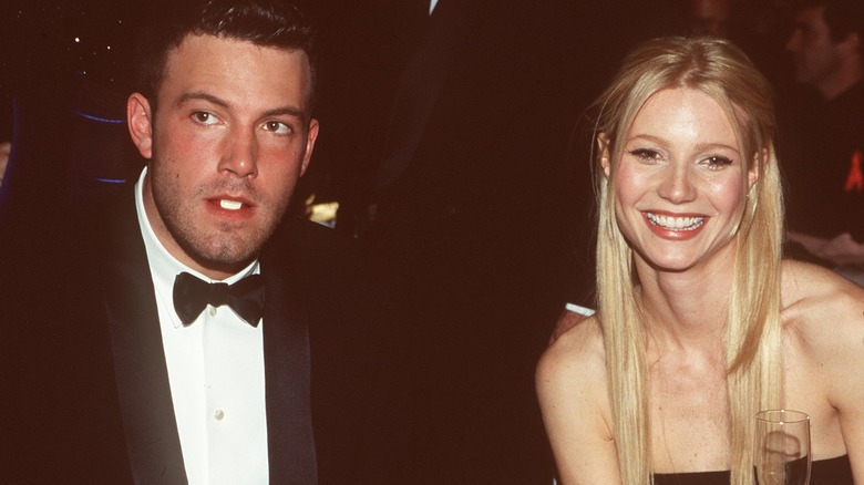 Ben Affleck eating next to Gwyneth Paltrow