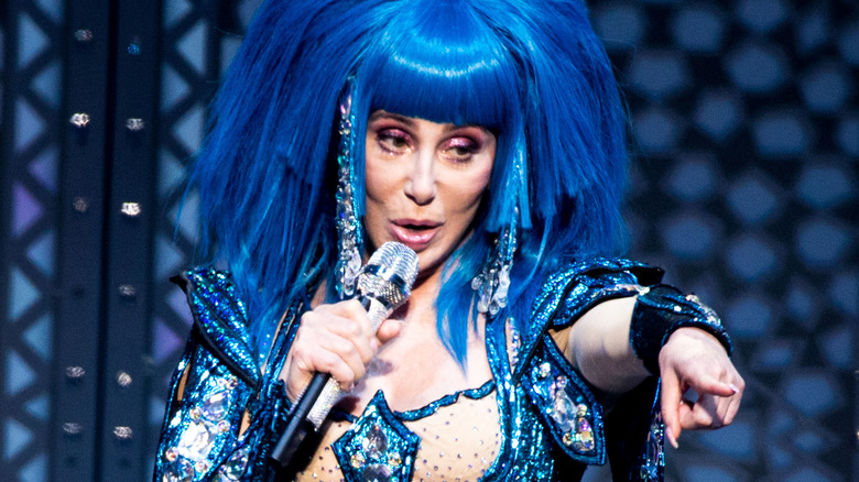 Cher singing and pointing 