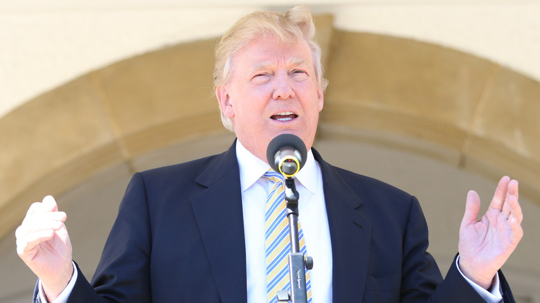 Donald Trump's hair blowing up as he speaks at his Turnberry Golf Club