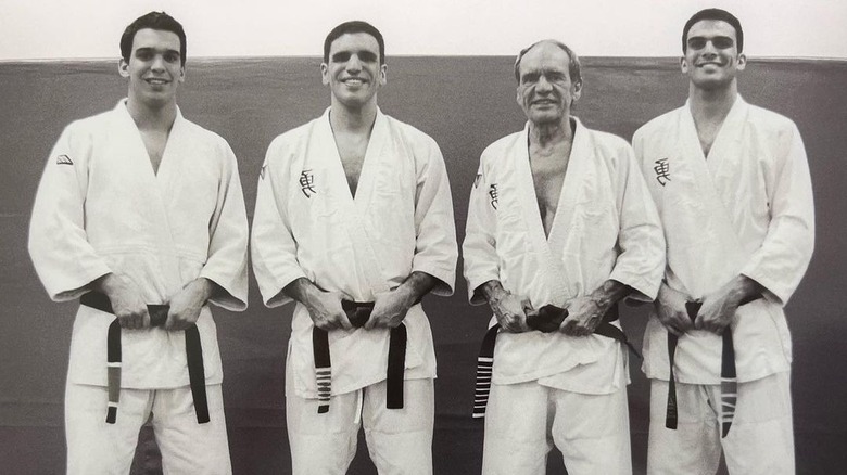 Joaquim Valente and his brothers pose in their gis