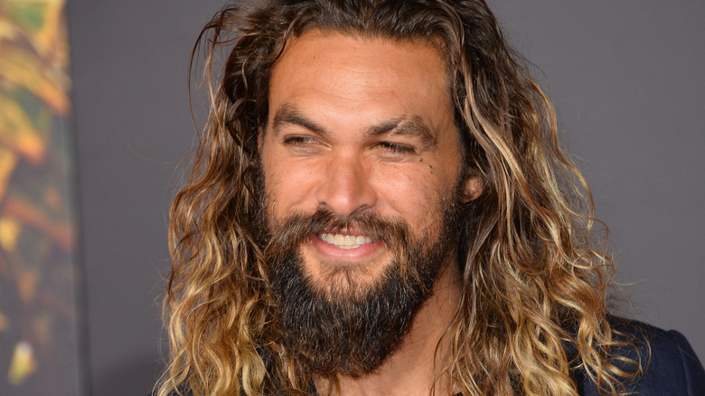 Jason Momoa grinning