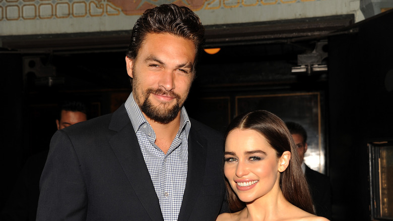 Jason Momoa and Emilia Clarke at an event 