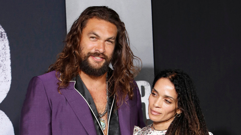 Jason Momoa and Lisa Bonet posing together