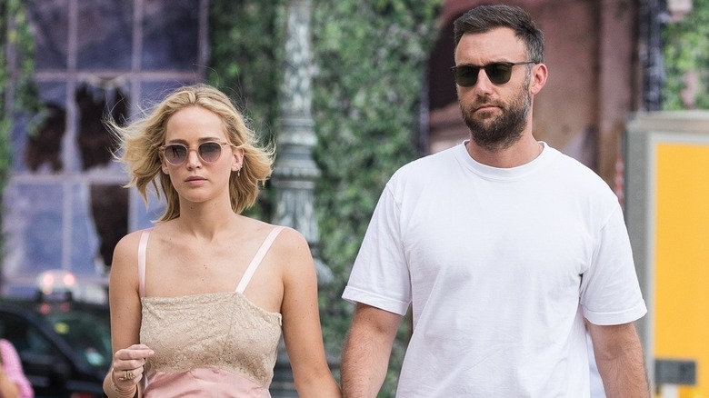 Jennifer Lawrence and Cooke Maroney walking in Paris