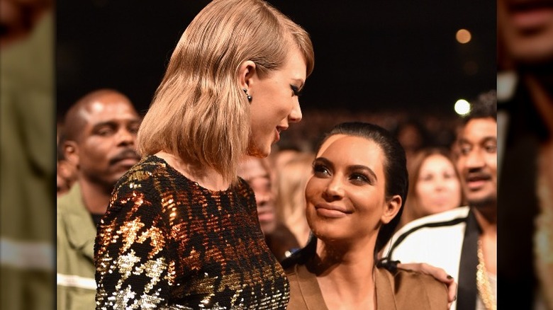 Kim Kardashian and Taylor Swift smiling together