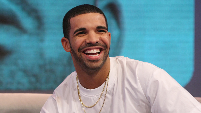 Drake smiling