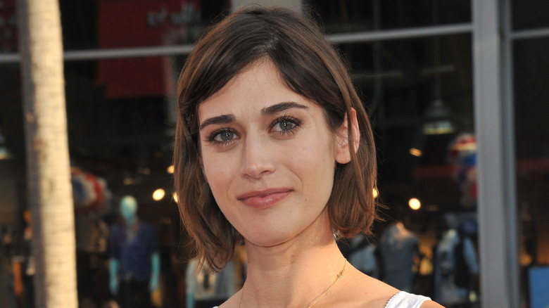 Lizzy Caplan smiling on the red carpet