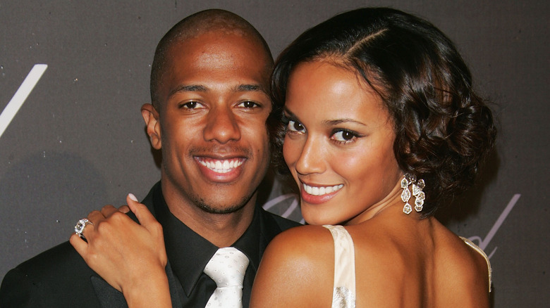 Selita Ebanks embracing Nick Cannon