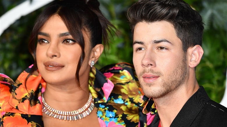 Nick Jonas and Priyanka Chopra, looking to the left