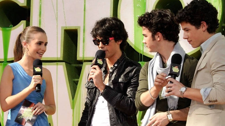 (L-R) Lily Collins, Joe, Kevin, and Nick Jonas at the 2009 KCAs