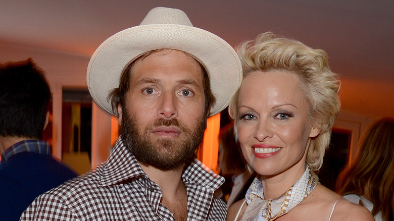 Pamela Anderson and Rick Salomon at an event 