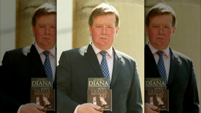 Former bodyguard Ken Wharfe holding the book he wrote, "Diana: Closely Guarded Secret"