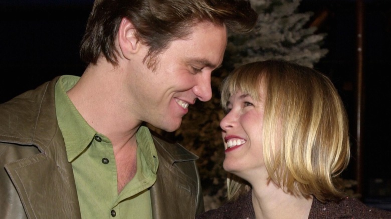 Jim Carrey and Renée Zellweger grinning 