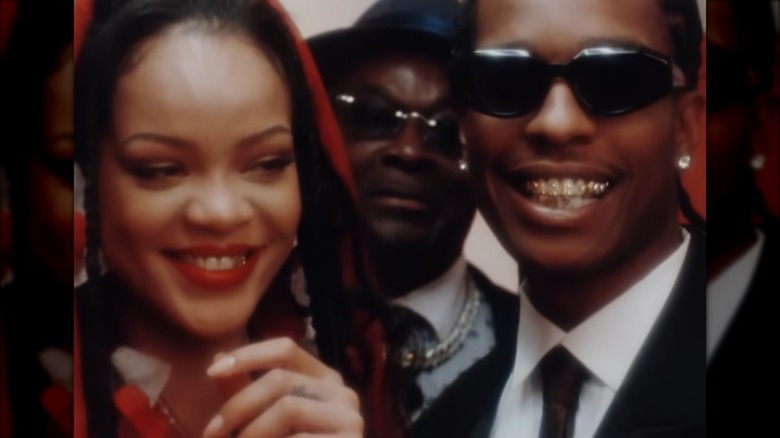 Rihanna and A$AP Rocky smiling in "D.M.D." music video