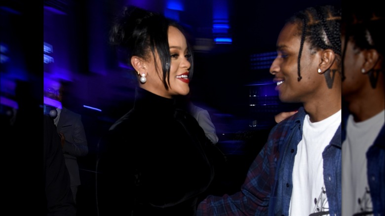 Rihanna and A$AP Rocky smiling 