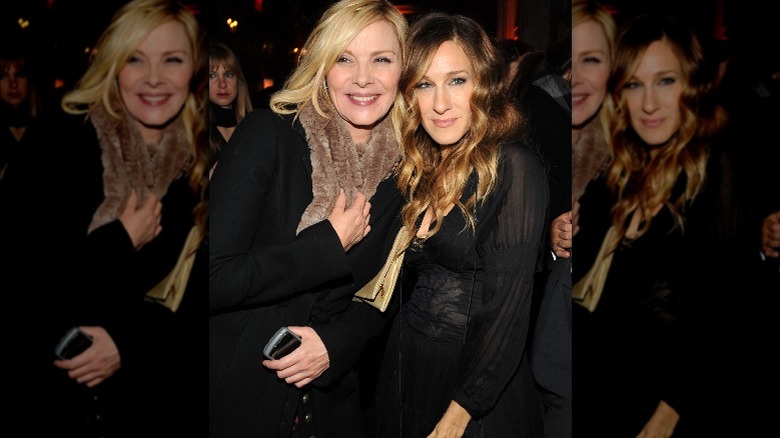 Kim Cattrall and Sarah Jessica Parker posing together in 2009