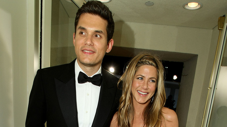 John Mayer and Jennifer Aniston smiling