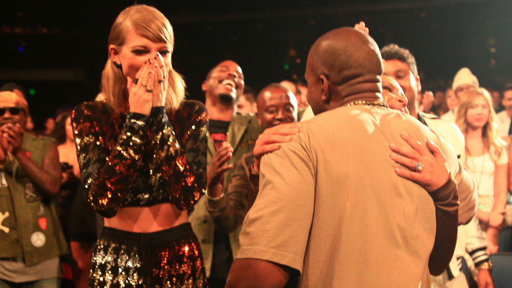 Taylor Swift, Kanye West and Kim Kardashian at award show in the crowd