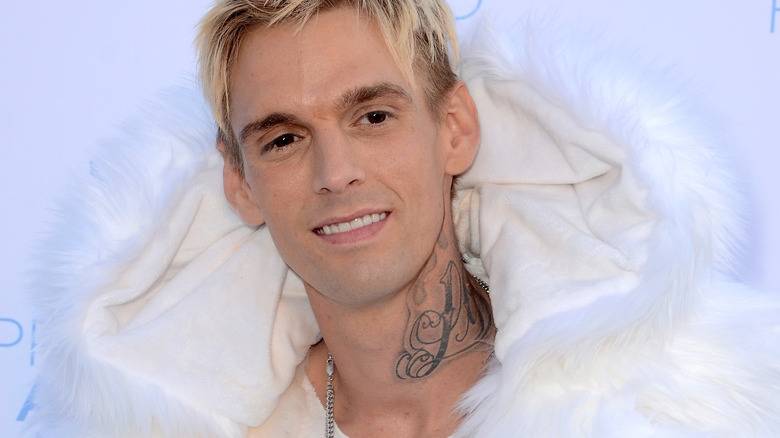 Aaron Carter white coat