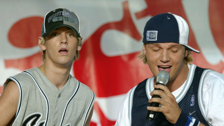 Aaron Carter and Nick Carter performing