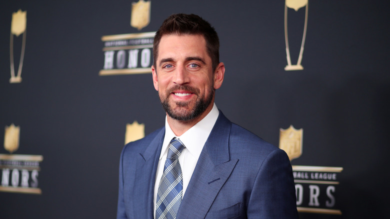 Aaron Rodgers poses 